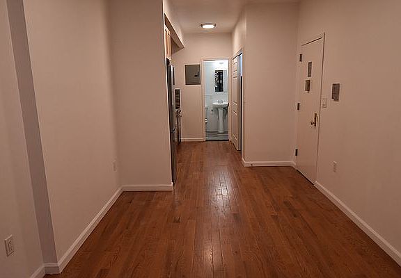 2nd image of 319 E 9th St APT 1