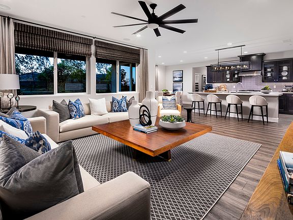 The open floor plan with seamless flow between Great Room, Kitchen and Dining