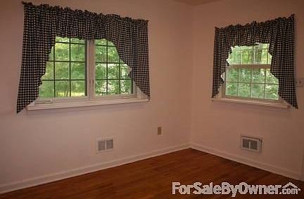 Possible office, den, family room with a half bath attached.