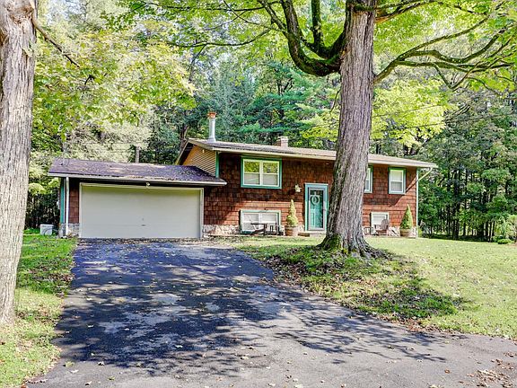 House with Driveway, Attached Two Car Garage and Large Sugar Maple