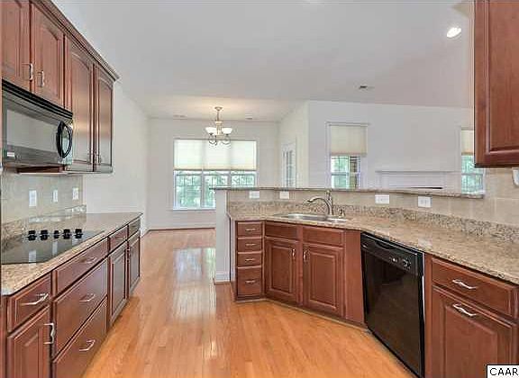 4th image of 75 Whispering Woods Pl