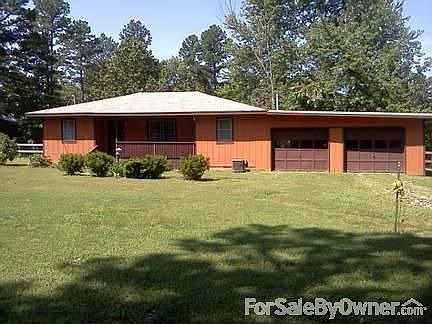Front of house : Charming home set just one mile out of town.
