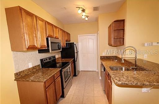 2nd image of 6151 Metrowest Blvd Unit 206