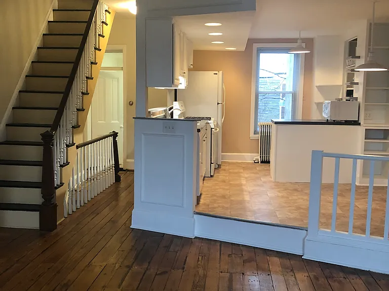 Main floor overview, staircase to third floor, laundry at the top of main stair case