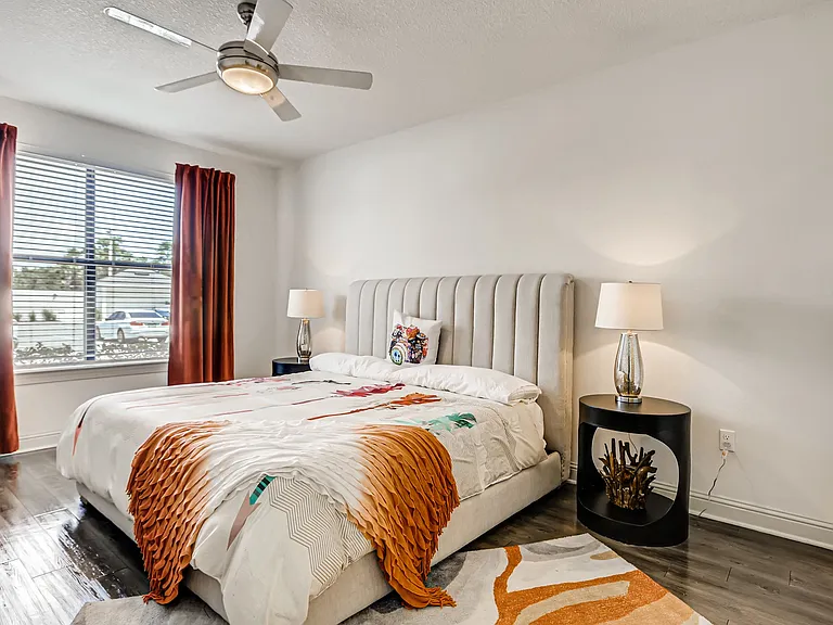 Bedroom with wood-designed flooring