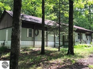 7711 Covert Rd NE, Mancelona, MI 49659