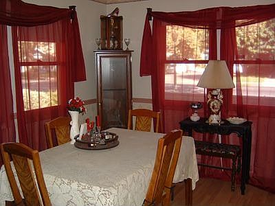 Large Formal Dining Room with lots of natural light and French Doors
