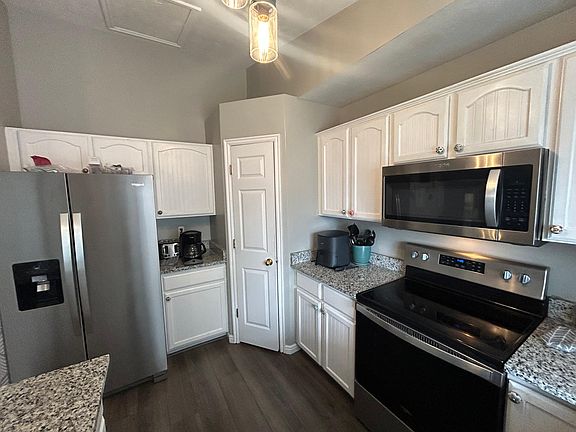 Kitchen (new flooring, stone countertops, appliances, and fixtures as of July 2023)
