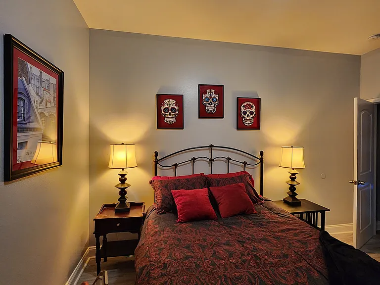 Second room with a queen sized bed