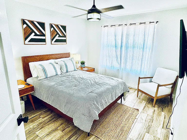 Bedroom with Queen Bed, sitting area, Smart TV