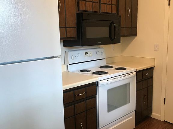 Kitchen with refrigerator, range, microwave and dishwasher