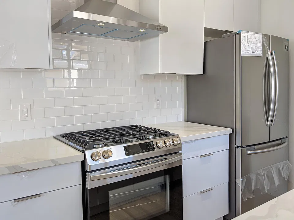 Slide-in stove and 36 inch fridge with ice maker