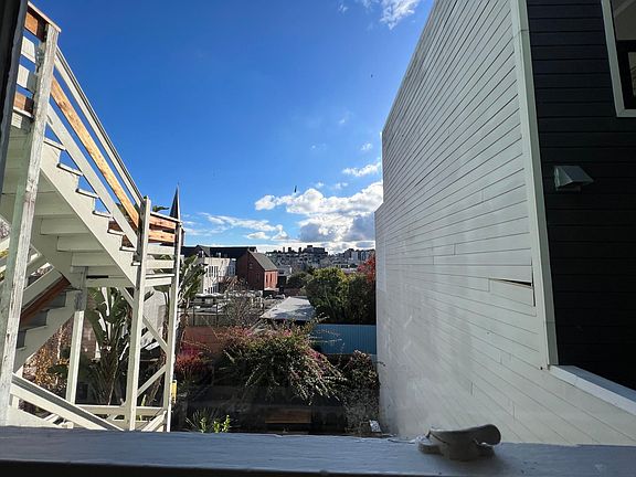 Views of backyard and sky