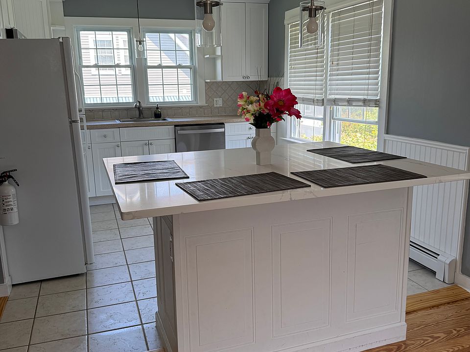 Island between kitchen and living room.