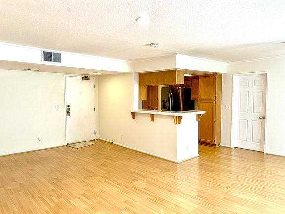 Living Room with Kitchen view