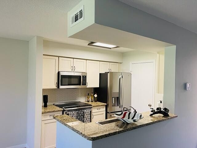 1st image of 815 W Boynton Beach Blvd 1-105