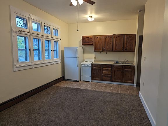 Kitchen with eat in dining area includes beautiful windows to allow natural light to cascade in!