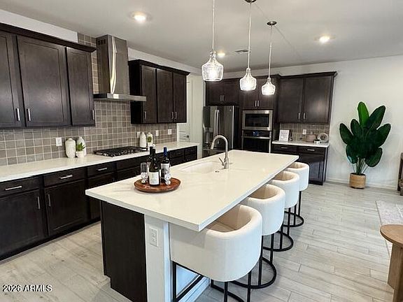 5th image of 2460 W ROWEL Road