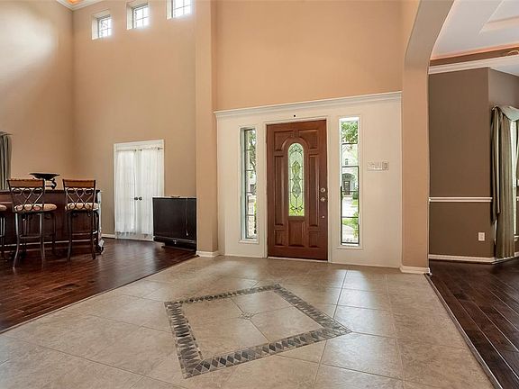 Amazing 20 Ft. High Ceilings in the Entry and Formal Living Area.