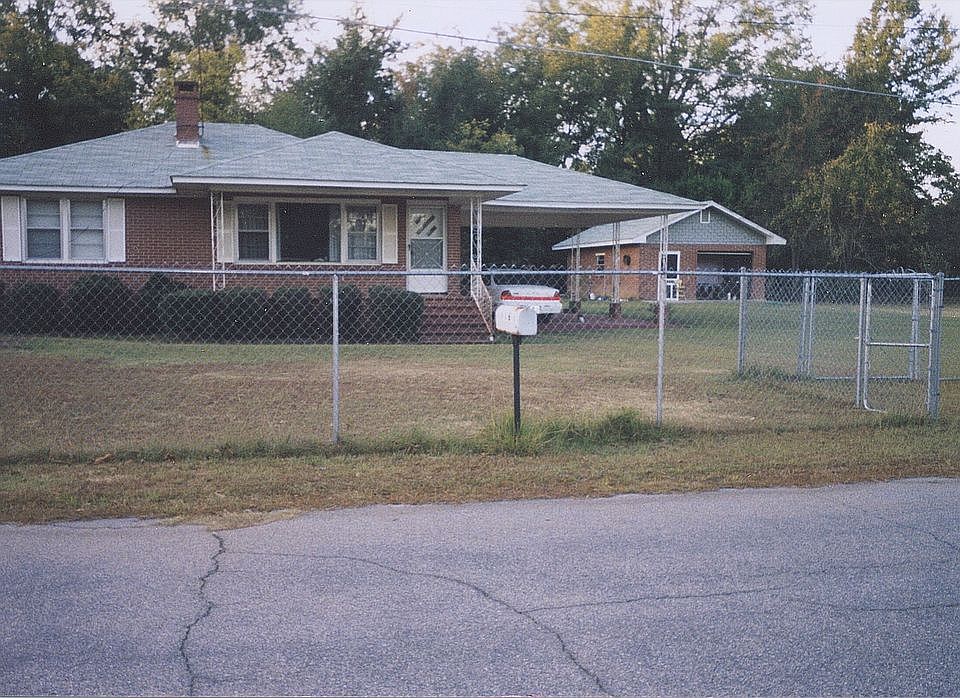 View of Home and Garage