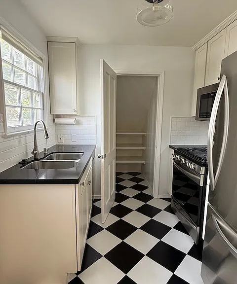 Kitchen with Storage door open