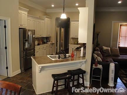 Large Kitchen with lots of cabinet space : attached walk-in pantry, separate office, and mud room of