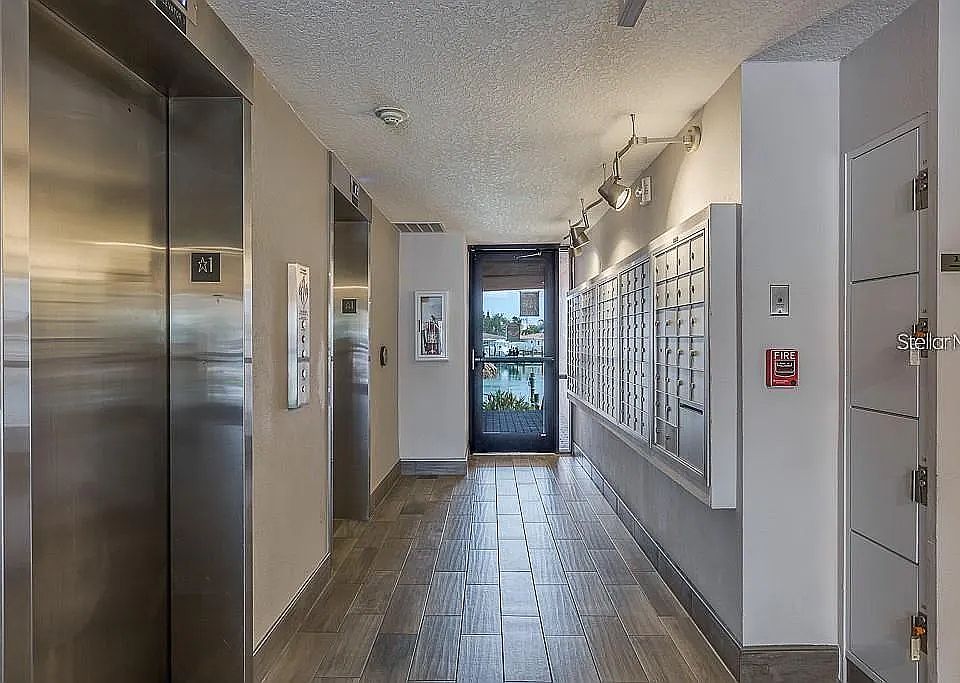 Elevators and mailroom front lobby at 51 Island Way.