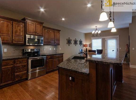 All stainless steel appliances stay in this Chef's kitchen perfe