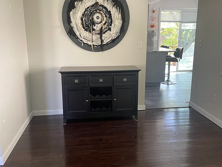 Space can be used as a dining room or extra sitting area.