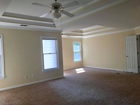Expansive sitting area in the master bedroom suite.