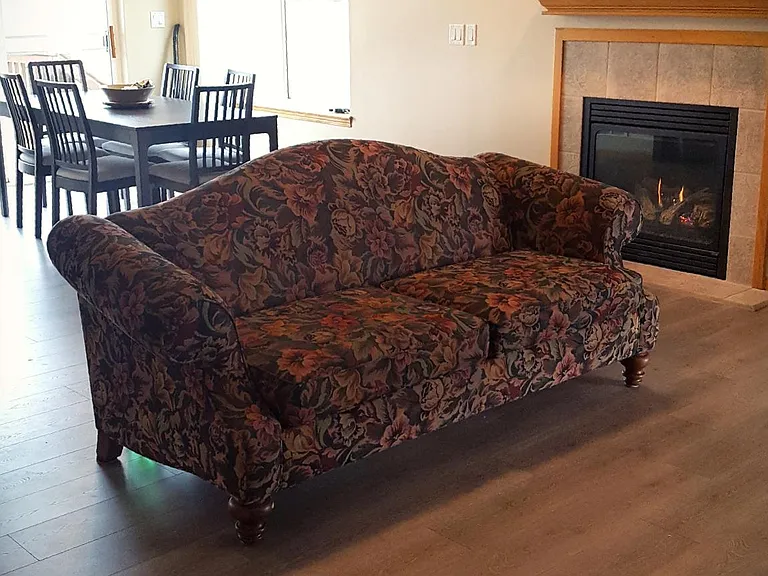 This picture of main floor living room shows the new flooring