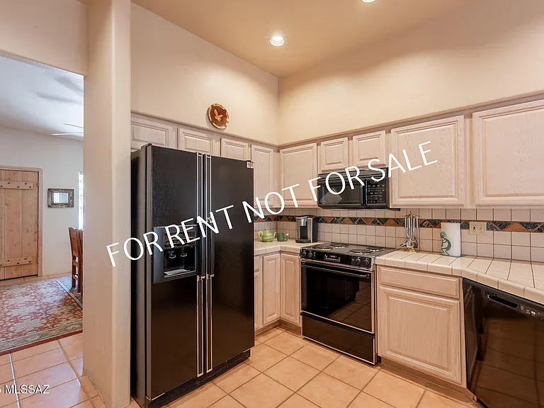 9876 N Ridge Shadow Pl — Photo 14