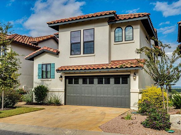Two car garage with two guest bedrooms above