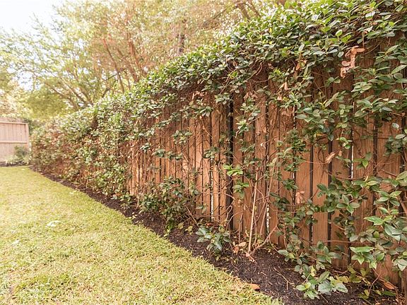 Yes - this home has a yard and well sized! Recently sodded and ready for summer. Mulched and added flower bed along back side of green space.