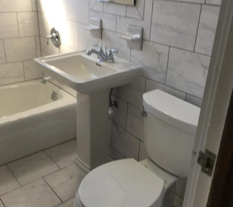 Full bath -all tiled - neutral color