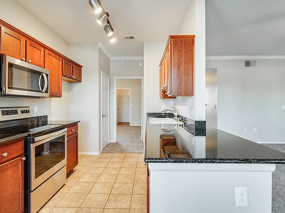 2nd image of 7009 E Acoma Dr Unit 1100