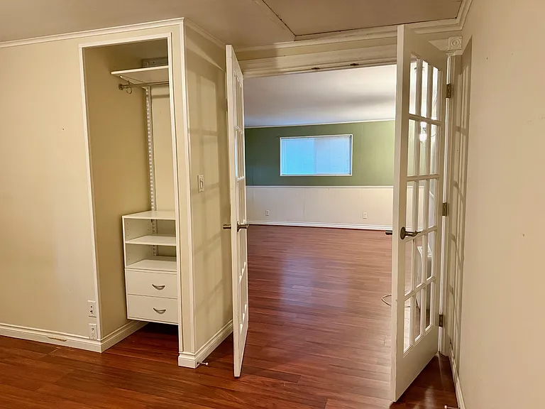 Bedroom or office with French doors to living room