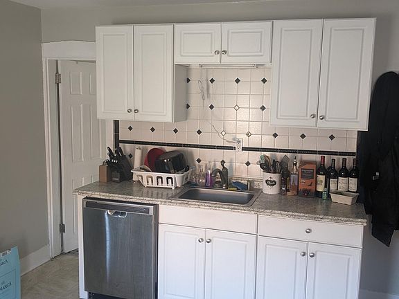 White cabinets and dishwasher