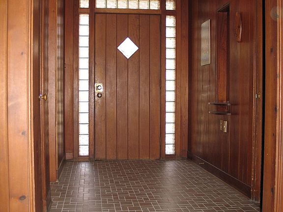 The Entry with glass block surround and a ceramic tile floor - 