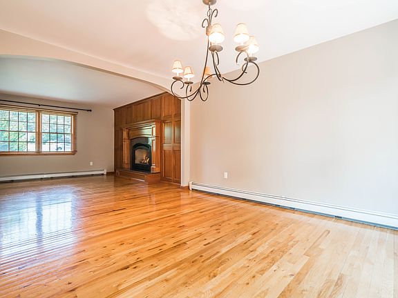View into living room from spacious dining room.