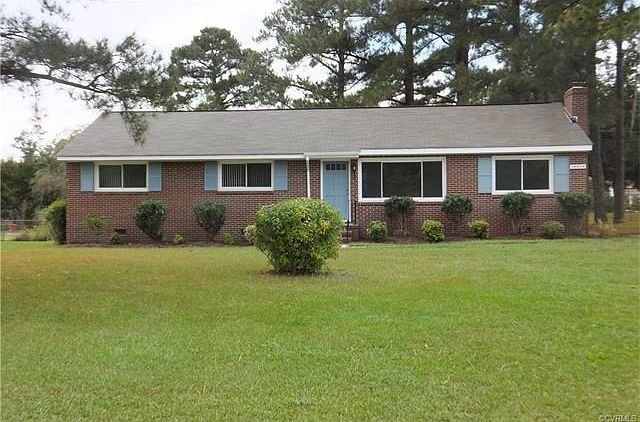 Your next home with low maintenance brick exterior on almost half an acre in fantastic, convenient location.  The exterior trim, windows, and shutters were just painted and the windows are brand new energy saving insulated windows