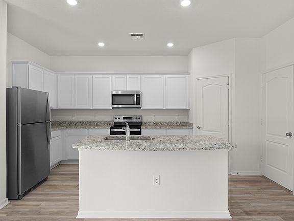 A chef-ready kitchen with a large island