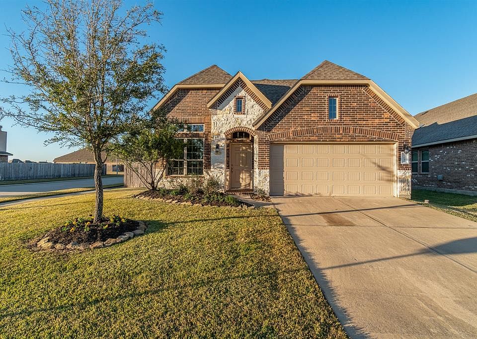 Lovely brick and stone elevation on a nice sized corner homesite!