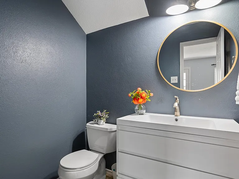 The half bath downstairs has been redone with modern touches!