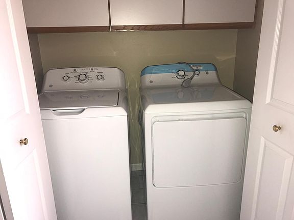 Washer and dryer off of kitchen