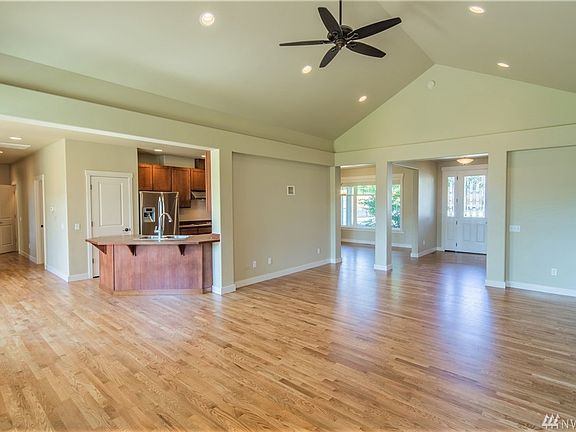Custom hardwood floors throughout the main living areas have all been newly refinished!