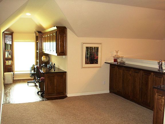 Work space and bar area in bonus room upstairs