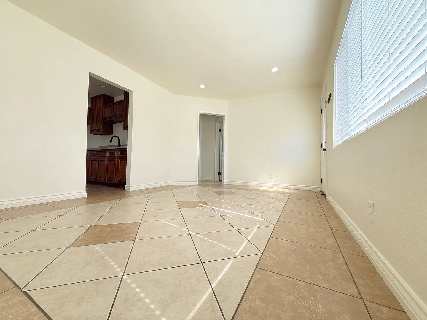 Spacious 4-Bedroom, 2-Bath Gated Home with Garage & Private Backyard — Photo 3