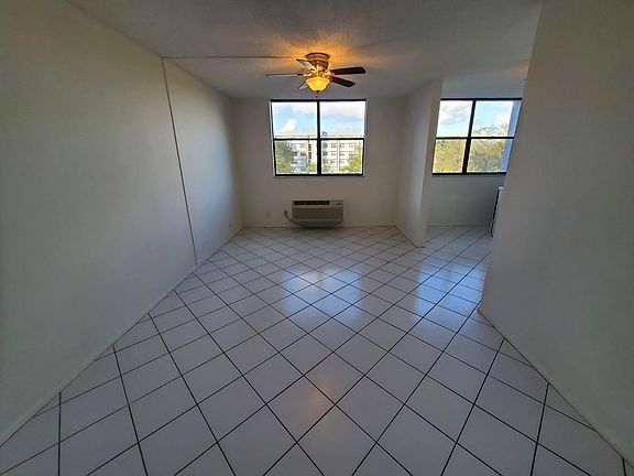 View from kitchen to main living area and secondary area on the right (alternatively secondary area may provide 1bdrm privacy with a barn door).