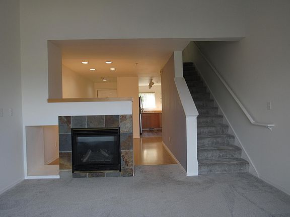 Mid-Level living area complete with gas fireplace and views of East Seattle Mountains